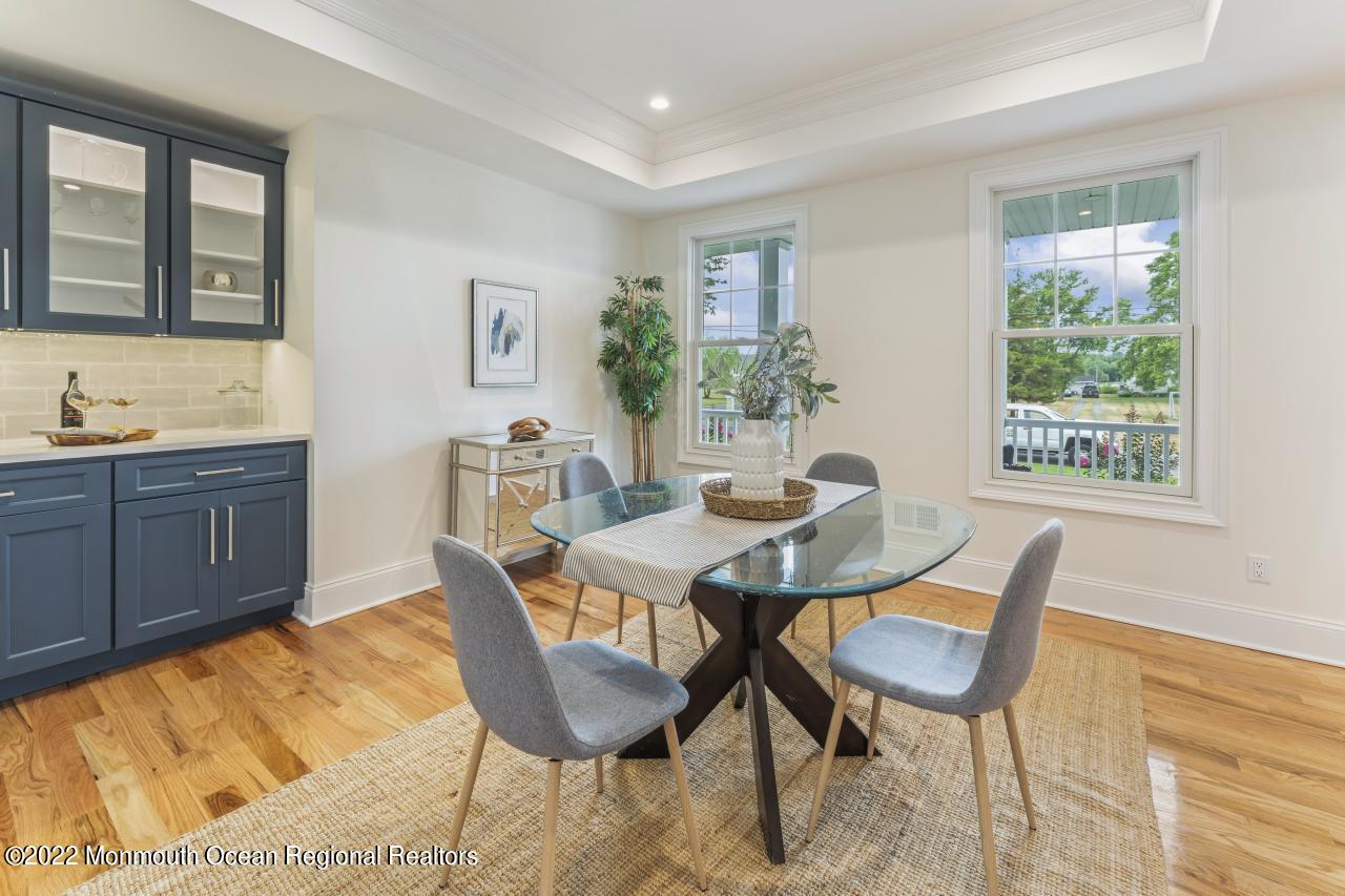 108 Horseneck Point Road Oceanport, NJ 07757 - Photo 19 of 37 a view of a dining room with furniture and window