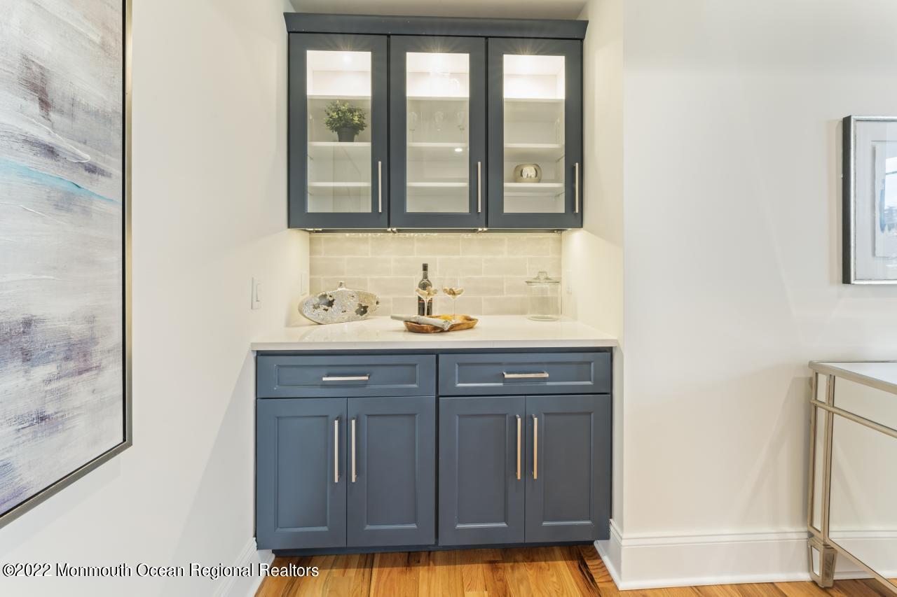 108 Horseneck Point Road Oceanport, NJ 07757 - Photo 20 of 37 a bathroom with a sink and a mirror