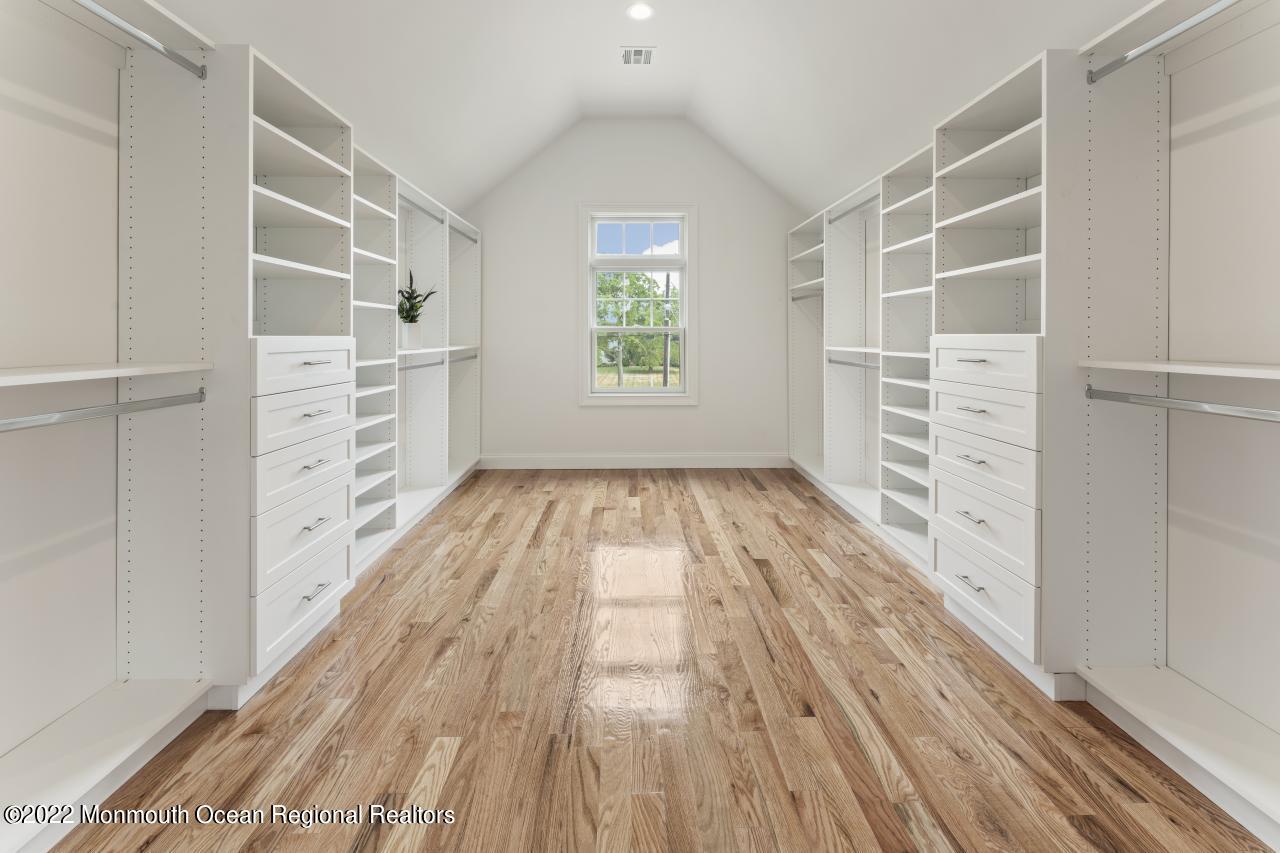 108 Horseneck Point Road Oceanport, NJ 07757 - Photo 28 of 37 a view of walk in closet with empty racks