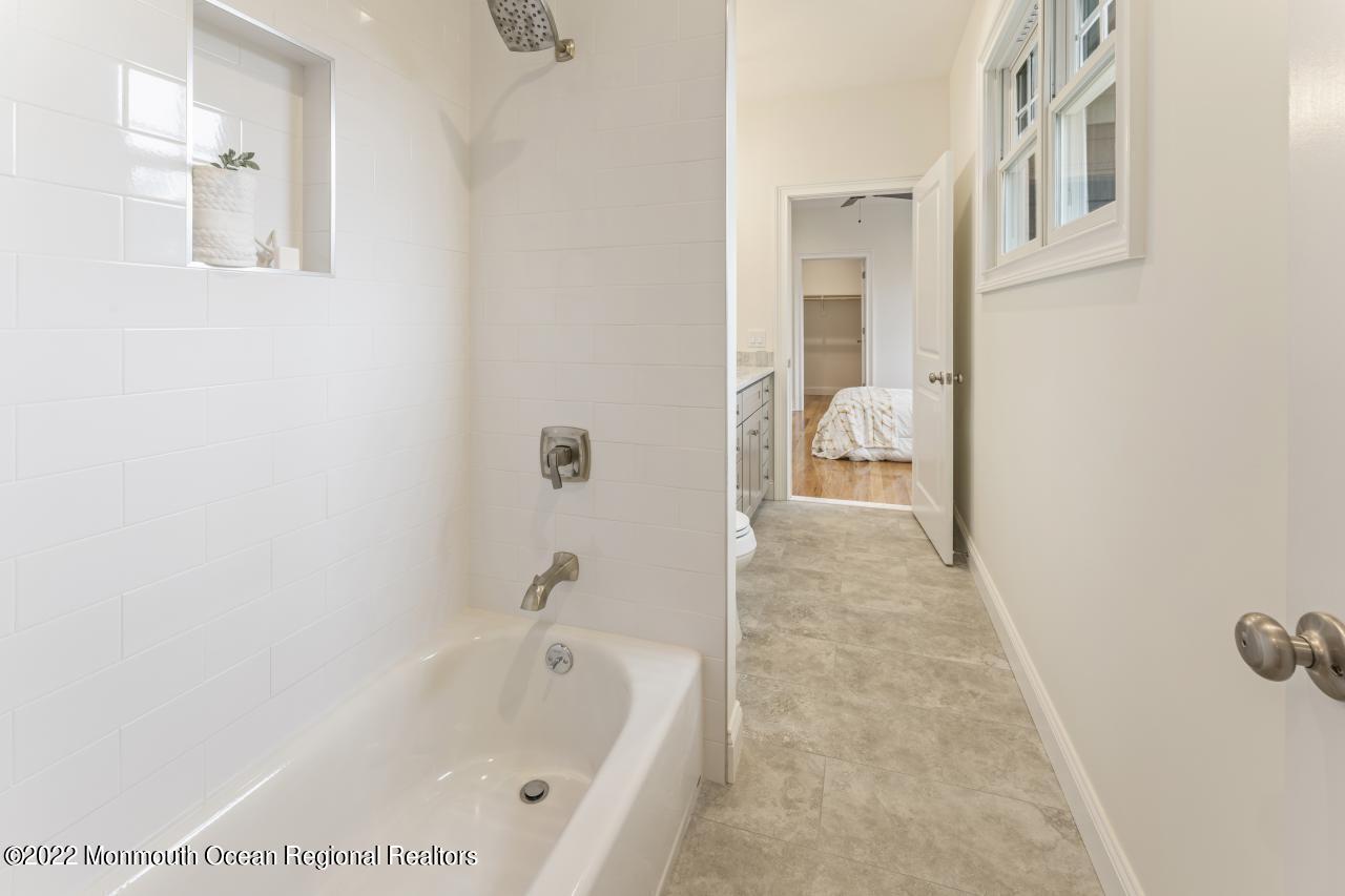 108 Horseneck Point Road Oceanport, NJ 07757 - Photo 32 of 37 a bathroom with a tub