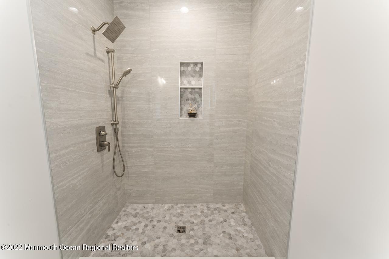 108 Horseneck Point Road Oceanport, NJ 07757 - Photo 35 of 37 a bathroom with a shower