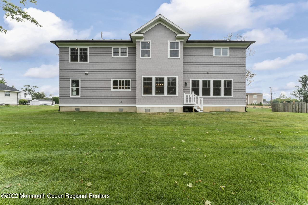 108 Horseneck Point Road Oceanport, NJ 07757 - Photo 36 of 37 a front view of a house with a yard