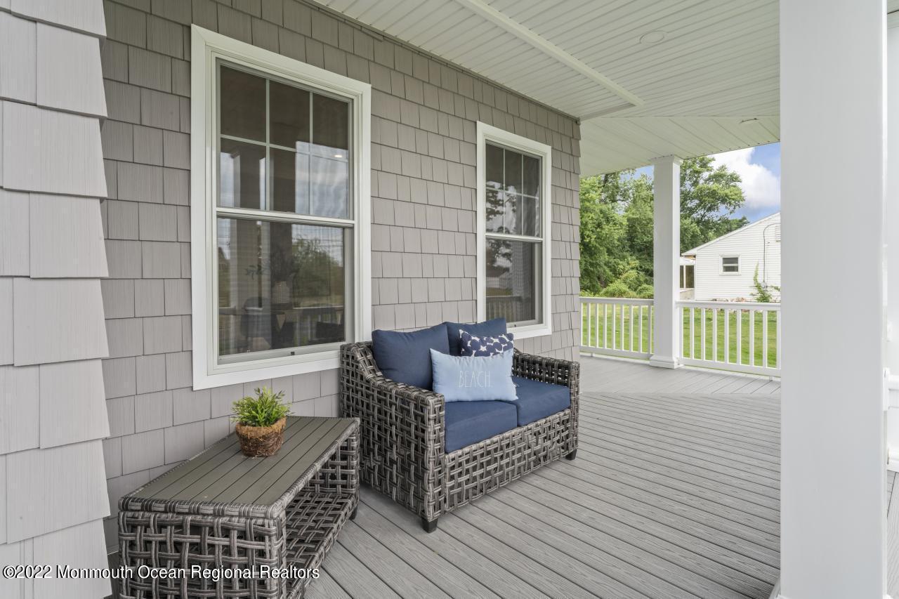 108 Horseneck Point Road Oceanport, NJ 07757 - Photo 6 of 37 a view of a living room and wooden deck