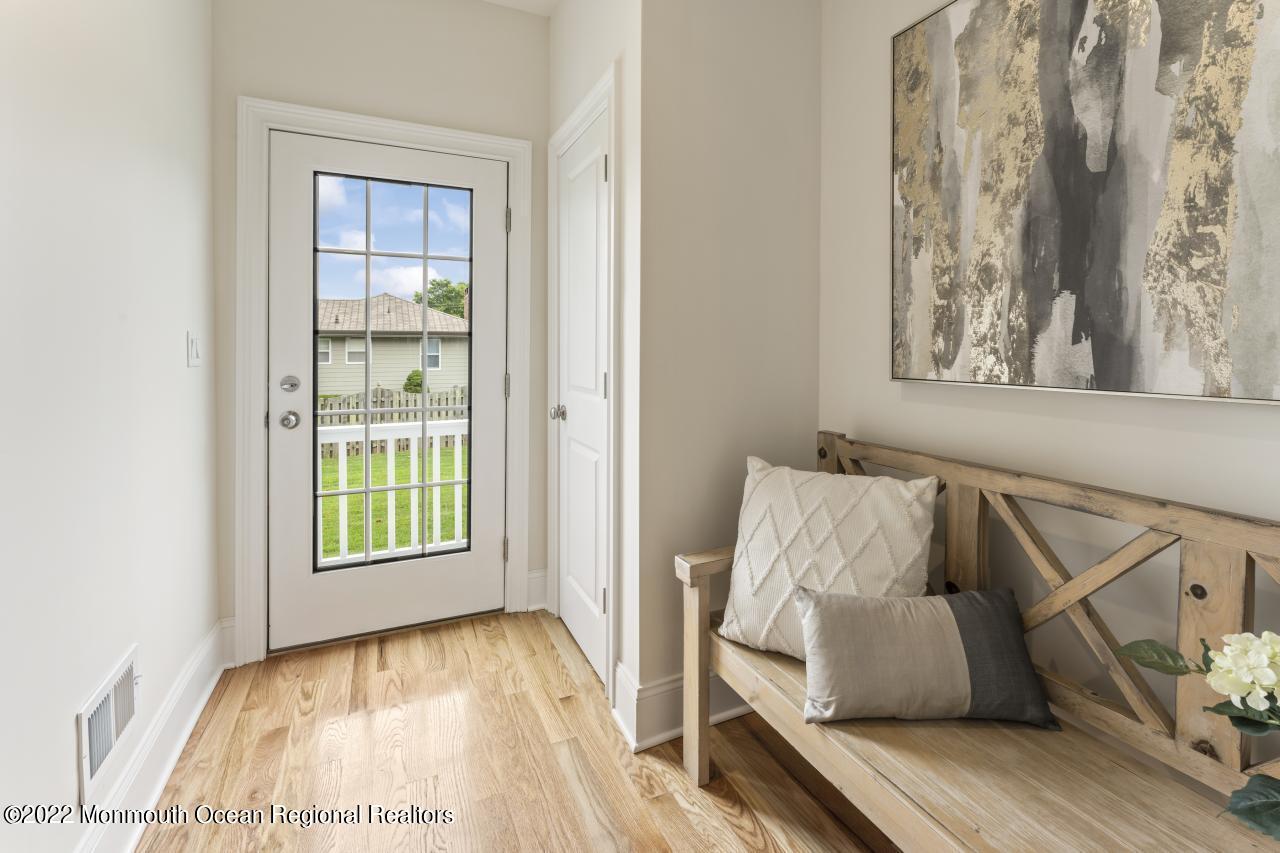 108 Horseneck Point Road Oceanport, NJ 07757 - Photo 9 of 37 a view of furniture and window in a room