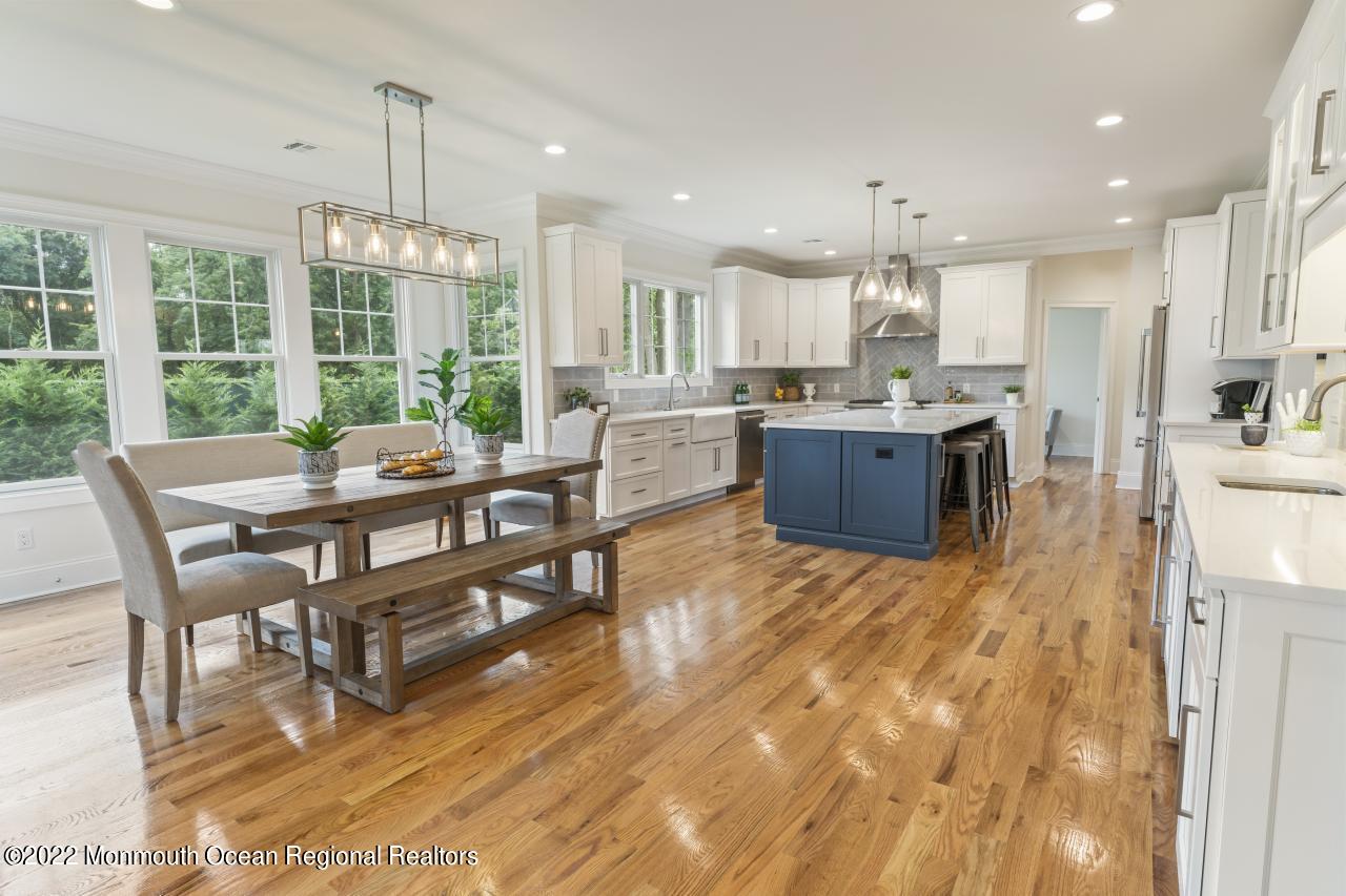 108 Horseneck Point Road Oceanport, NJ 07757 - Photo 10 of 37 a living room with kitchen island furniture and a large window
