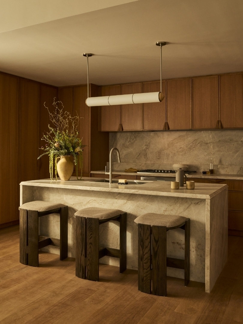323 Bergen Street, Unit PH702W Brooklyn, NY 11217 - Photo 2 of 14 a kitchen with a sink a counter and chairs