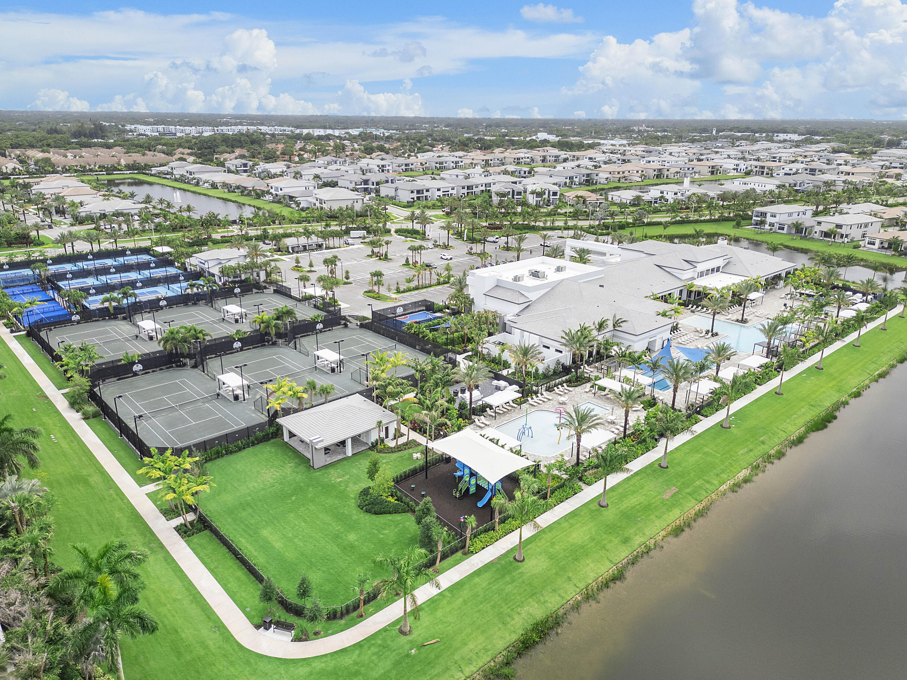 9322 Sunflower Mdw Road Boca Raton, FL 33434 - Photo 17 of 87 an aerial view of residential houses with outdoor space and river