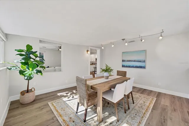 a view of a dining room with furniture wooden floor