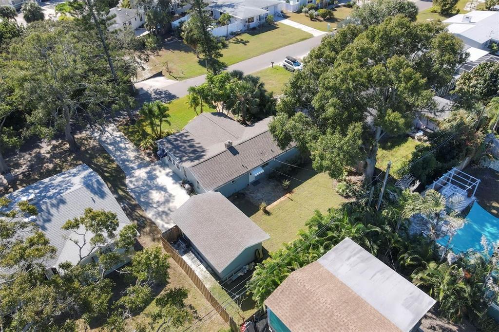 4737 Del Rio Way South Gulfport, FL 33711 - Photo 31 of 55 an aerial view of a house with a yard and lake view