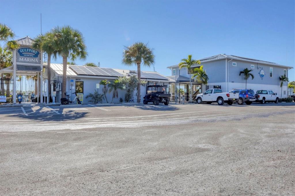 4737 Del Rio Way South Gulfport, FL 33711 - Photo 34 of 55 a front view of a building with streets and trees