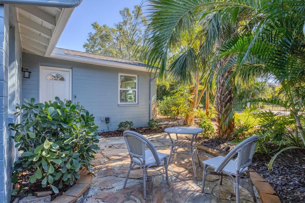 4737 Del Rio Way South Gulfport, FL 33711 - Photo 4 of 55 a view of a wooden chairs in patio of a house