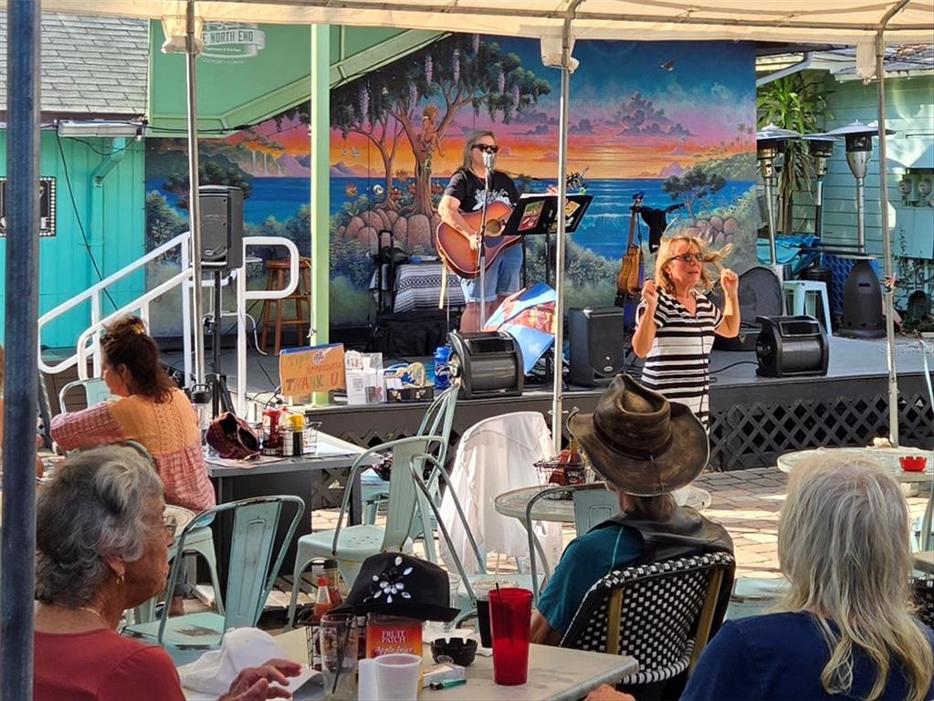 4737 Del Rio Way South Gulfport, FL 33711 - Photo 46 of 55 a view of dinning table and chairs in patio