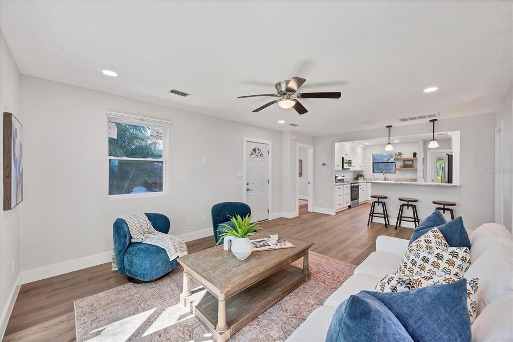 4737 Del Rio Way South Gulfport, FL 33711 - Photo 8 of 55 a living room with furniture and wooden floor