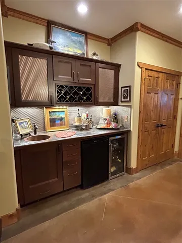 a fireplace with a clock on wall