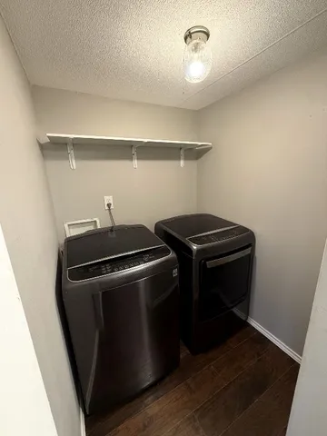 a utility room with washer and dryer