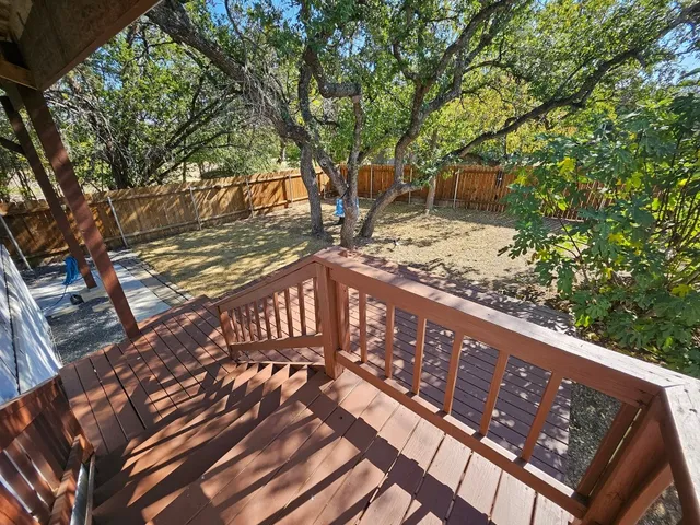 a view of a wooden fence