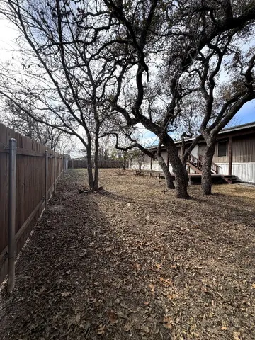 a view of house with outdoor space
