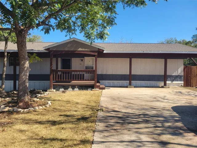 a house view with a outdoor space