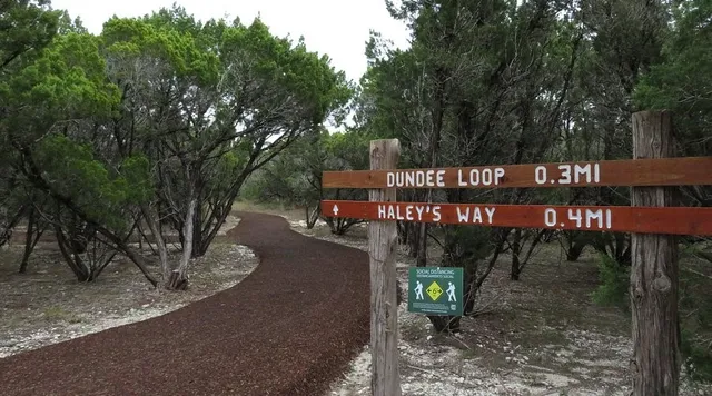 a view of a street with sitting area