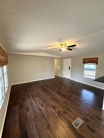 a view of an empty room and window