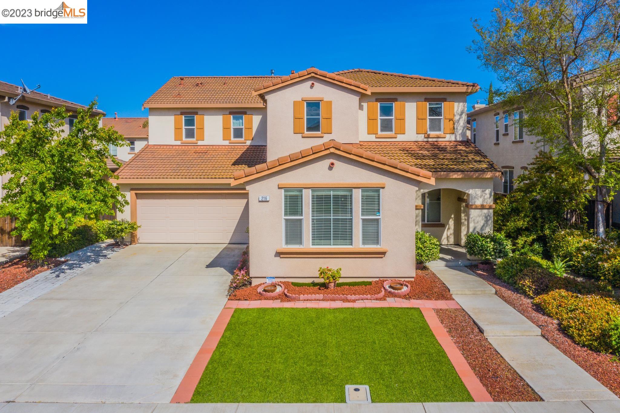 216 Hearthstone Circle Oakley, CA 94561 - Photo 1 of 1 a front view of a house with yard