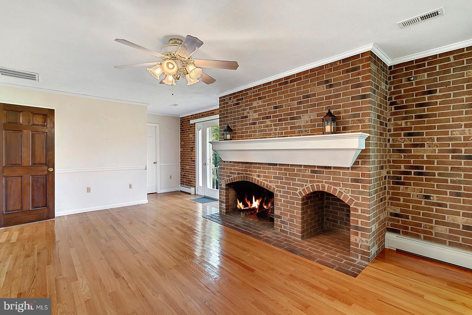754 Rudasill Mill Road Sperryville, VA 22740 - Photo 14 of 29 Family room off of kitchen rear patio access