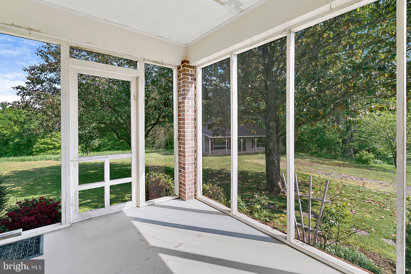 754 Rudasill Mill Road Sperryville, VA 22740 - Photo 26 of 29 Screen side porch off of Dining Room