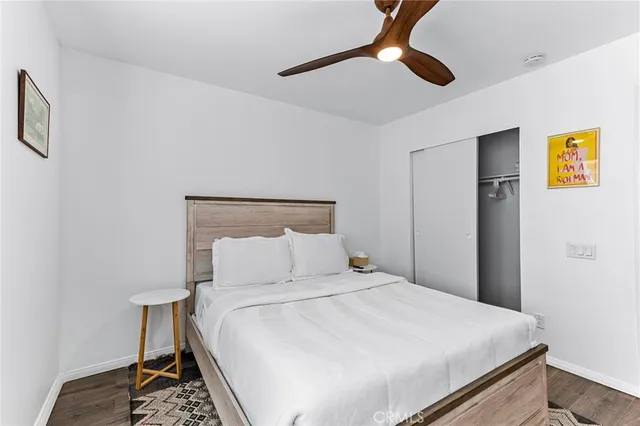 a view of a backyard with table and chairs and a small yard