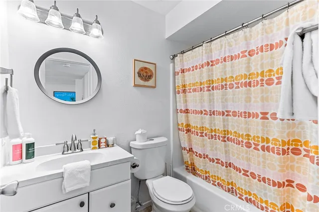 a swimming pool with outdoor seating and yard