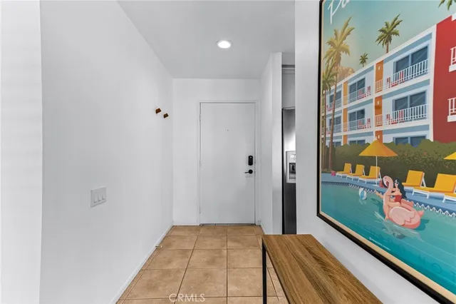 a living room with fireplace furniture and a flat screen tv