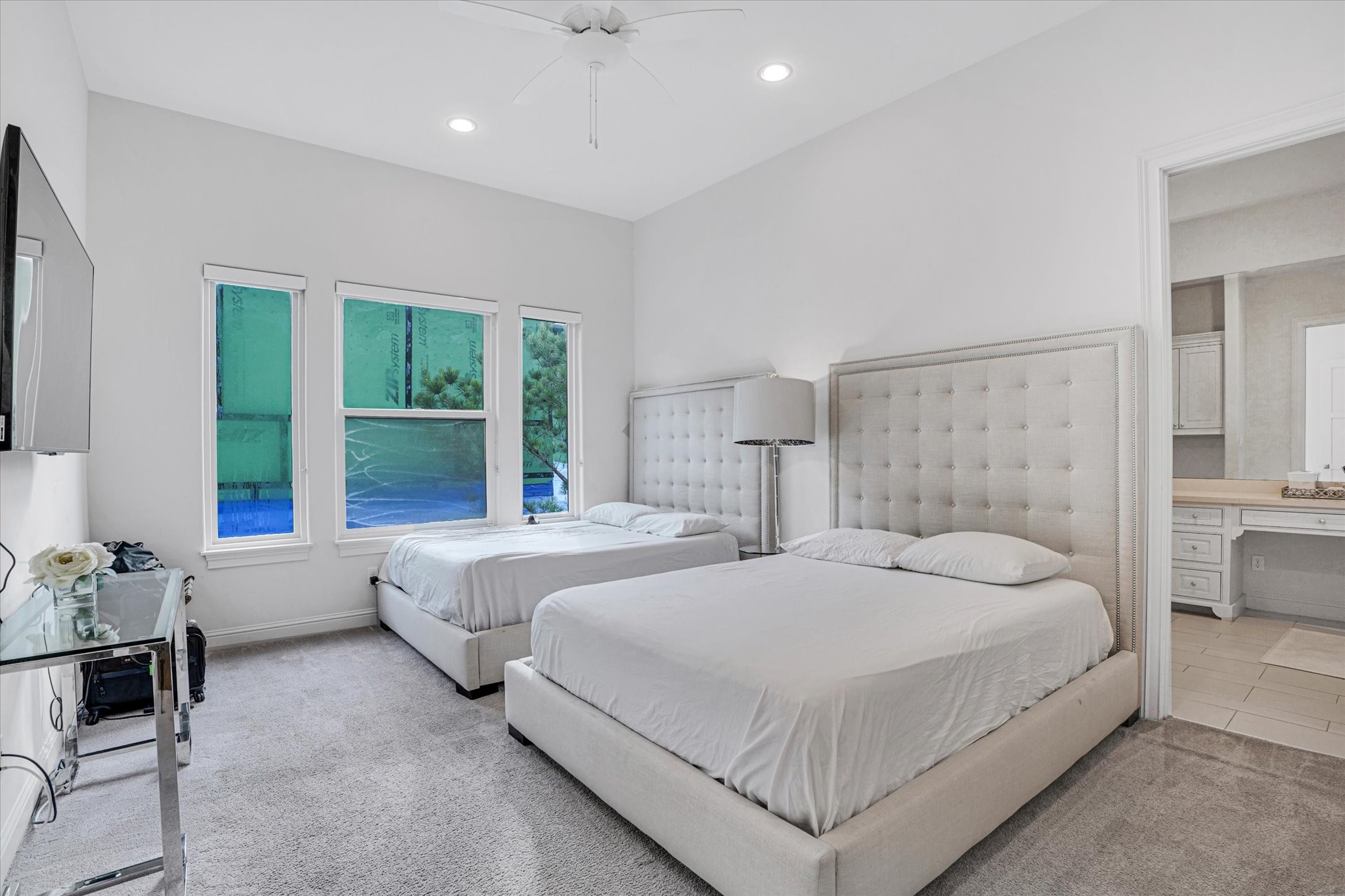 42 Pronghorn Place Spring, TX 77389 - Photo 29 of 47 a bedroom with a large bed and a couch