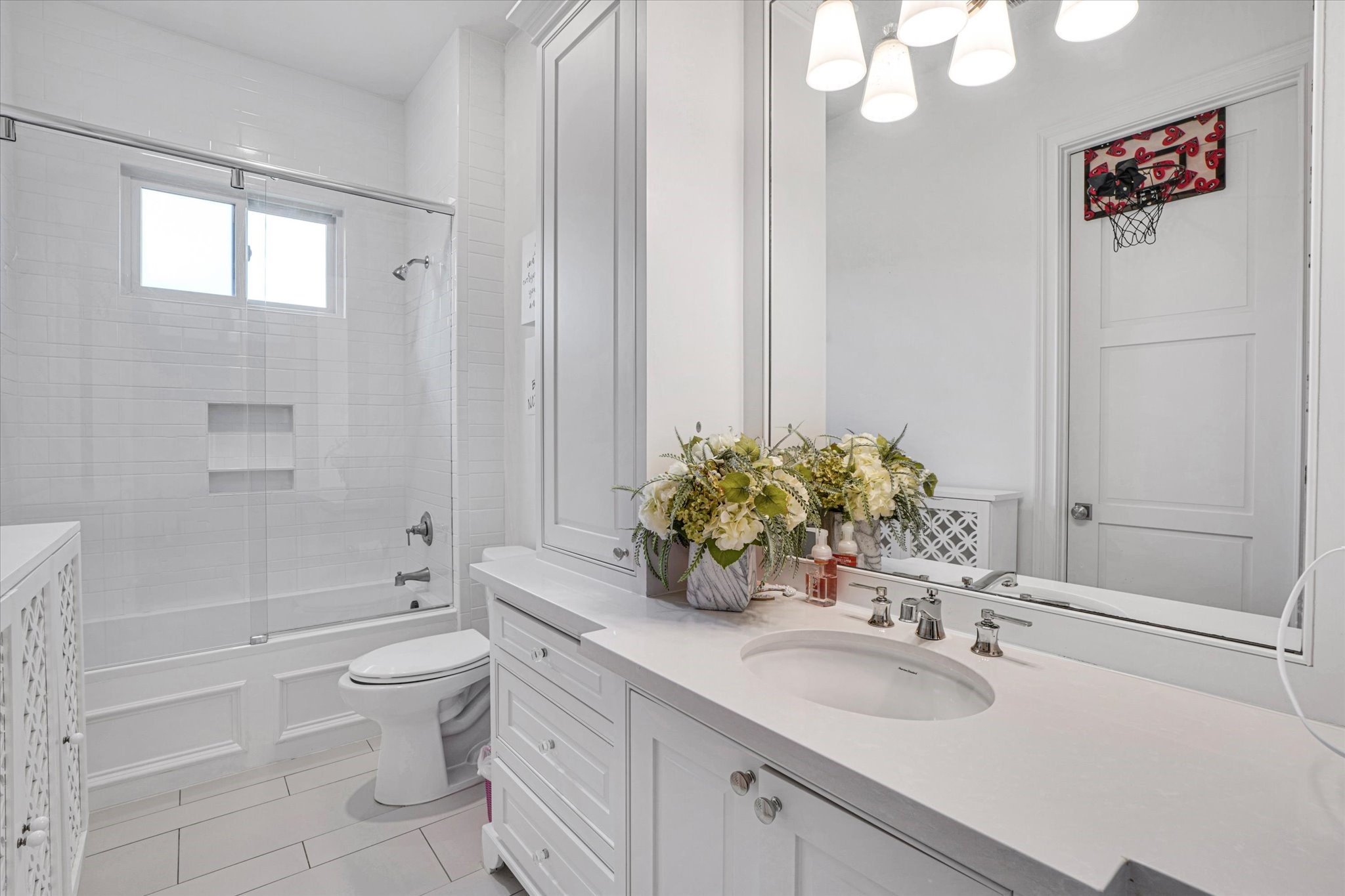 42 Pronghorn Place Spring, TX 77389 - Photo 39 of 47 a bathroom with a granite countertop sink a toilet and shower
