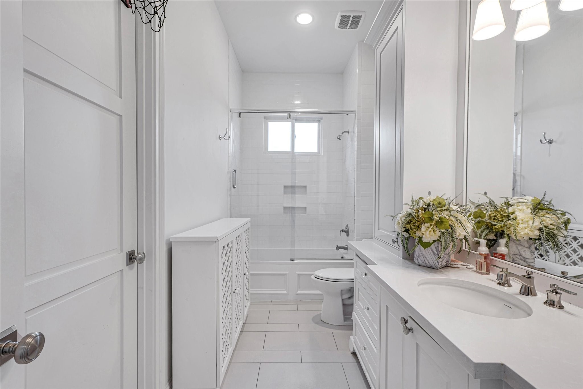 42 Pronghorn Place Spring, TX 77389 - Photo 40 of 47 a bathroom with a double vanity sink toilet and shower
