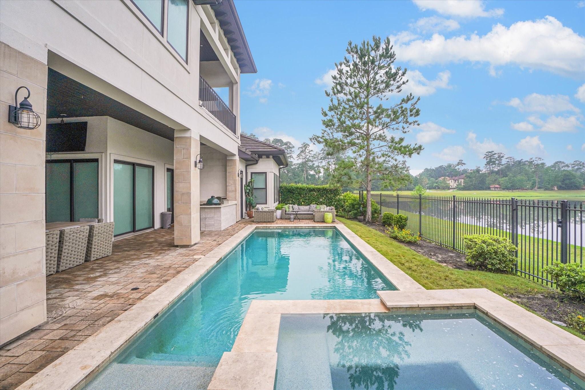 42 Pronghorn Place Spring, TX 77389 - Photo 46 of 47 a view of a house with a swimming pool