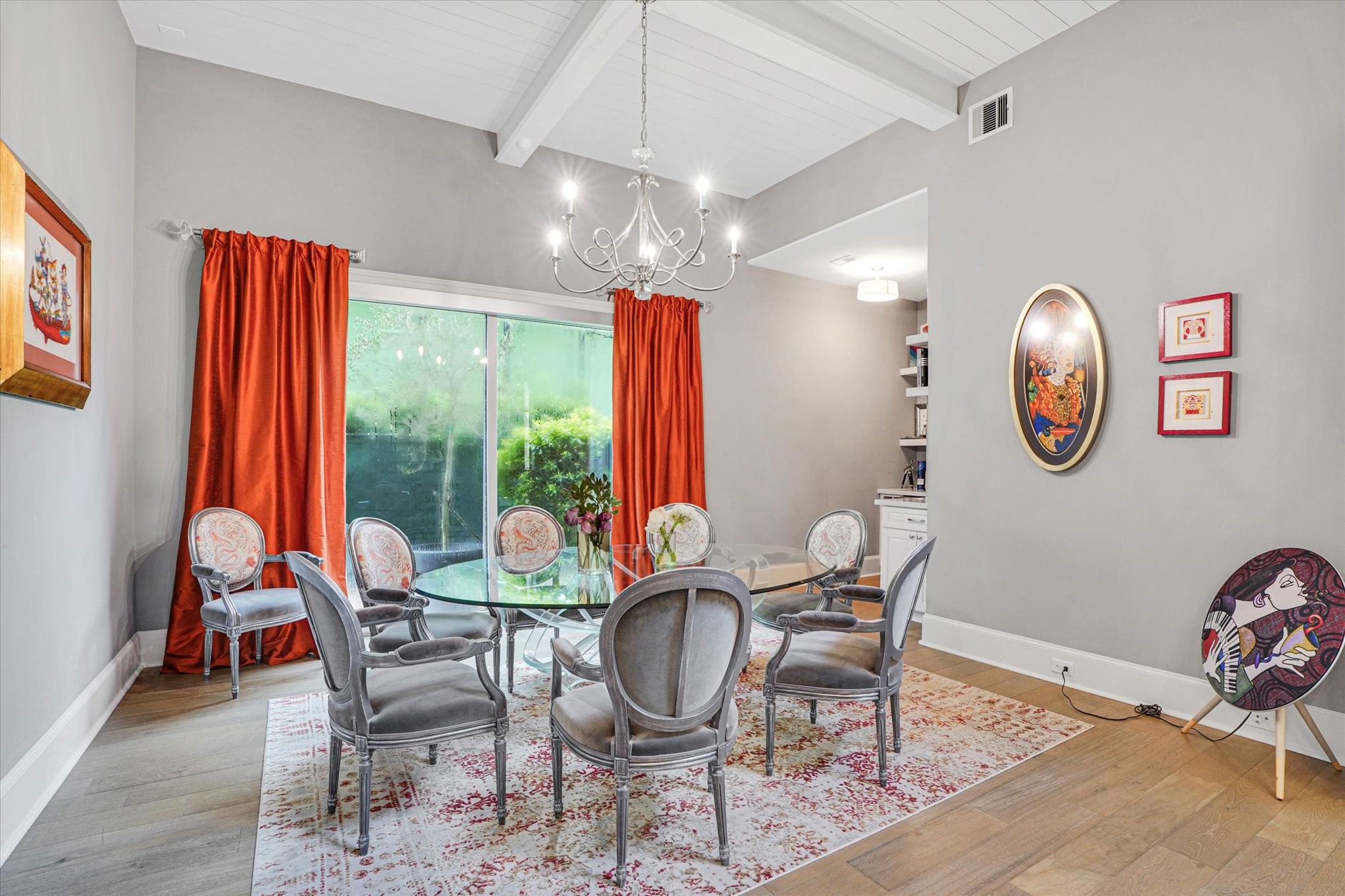 42 Pronghorn Place Spring, TX 77389 - Photo 7 of 47 a dining room with furniture a rug and a chandelier