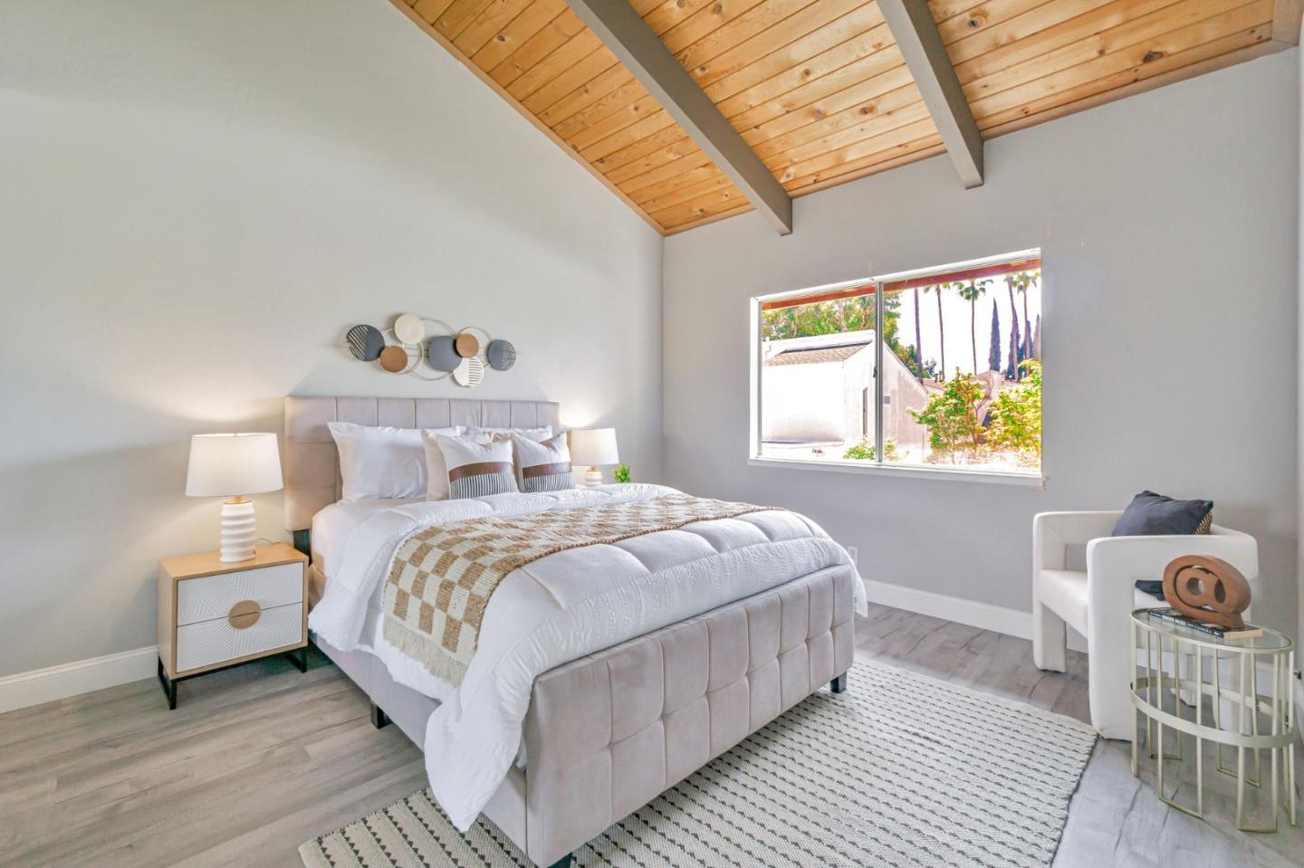 1680 Laguna Street, Unit H Concord, CA 94520 - Photo 6 of 12 a bedroom with a bed and a window