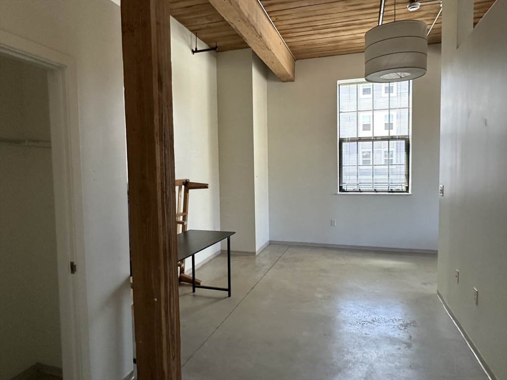 88 Gerrish Avenue, Unit 207 Chelsea, MA 02150 - Photo 2 of 10 a view of an empty room with a window