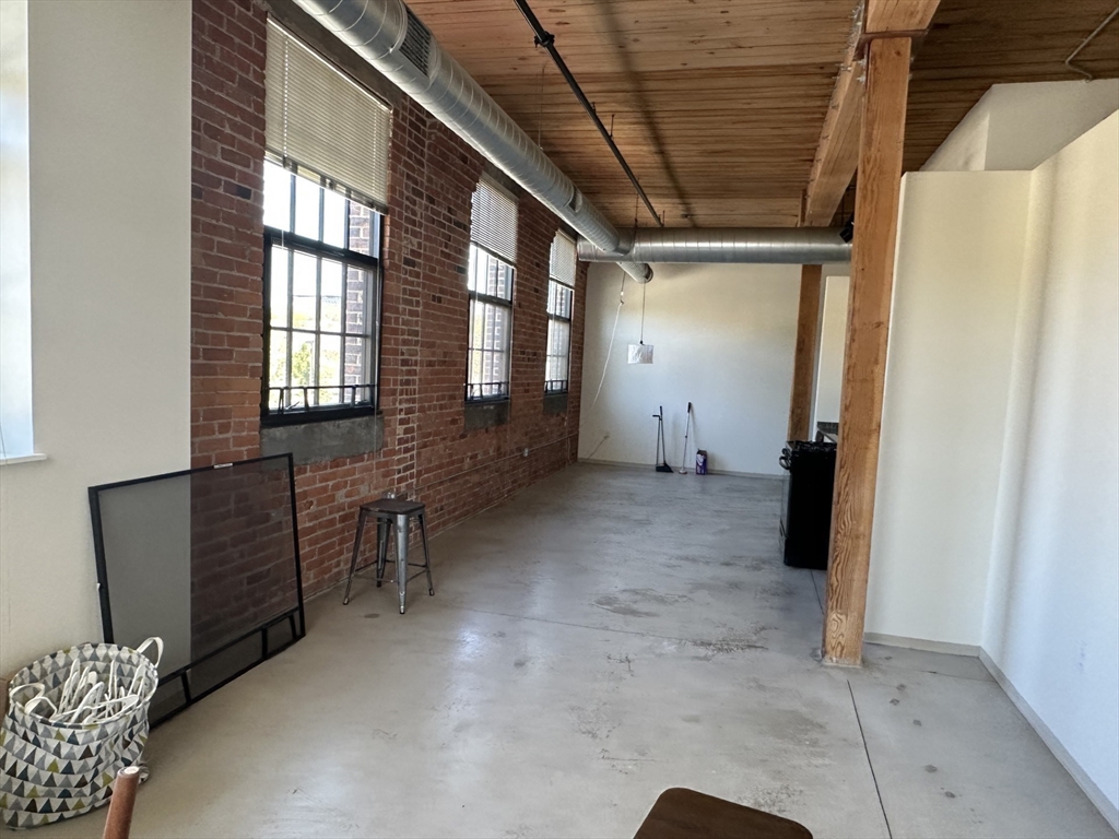 88 Gerrish Avenue, Unit 207 Chelsea, MA 02150 - Photo 3 of 10 a view of an empty room with a window