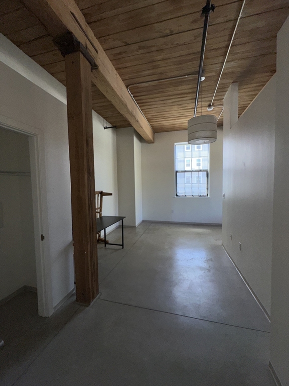 88 Gerrish Avenue, Unit 207 Chelsea, MA 02150 - Photo 9 of 10 a view of empty room with windows