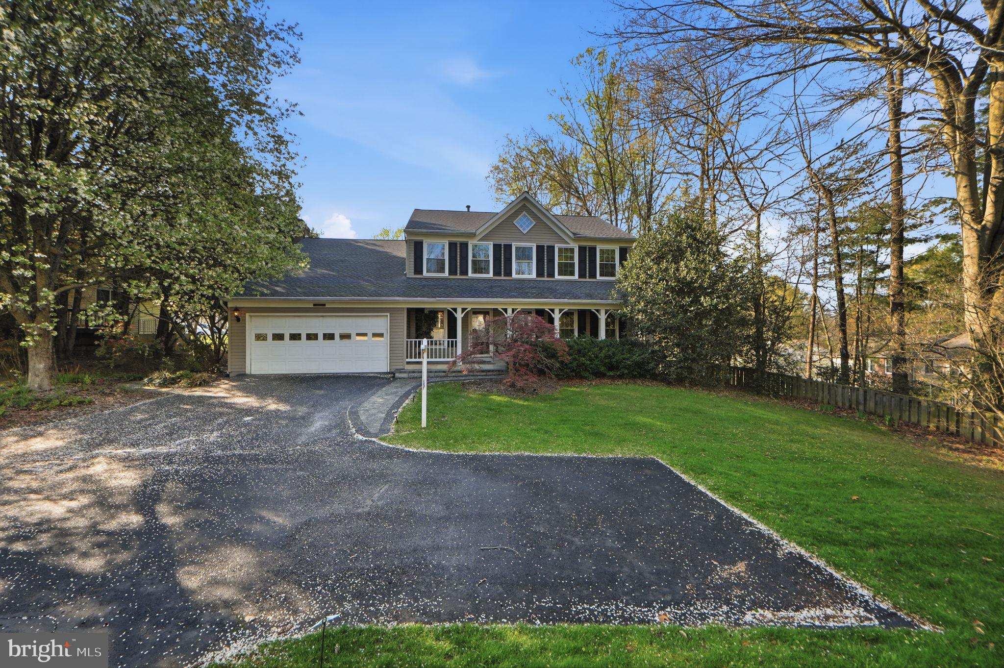 7504 Mullingar Court Springfield, VA 22153 - Photo 3 of 60 a view of a house with a yard
