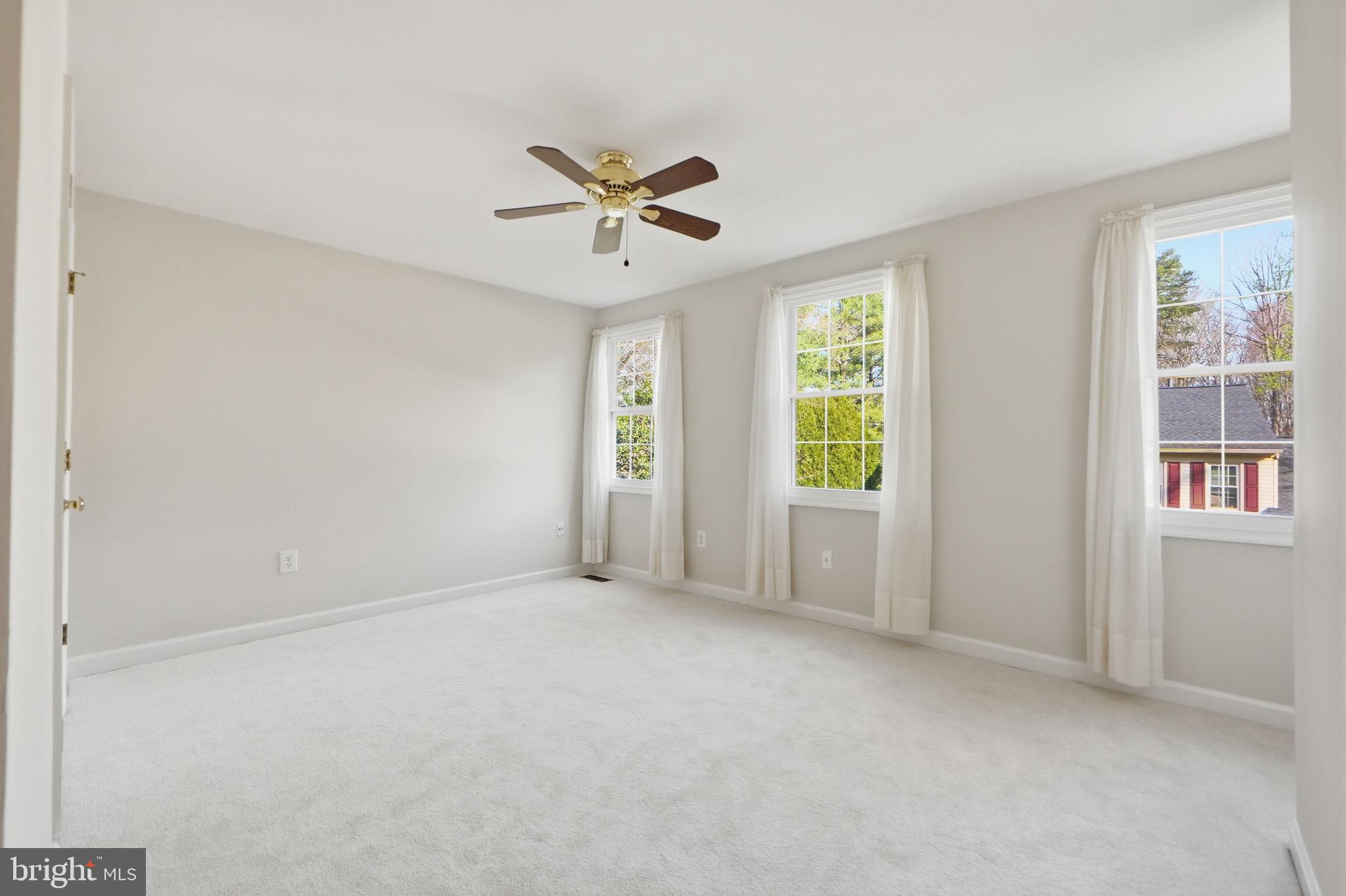 7504 Mullingar Court Springfield, VA 22153 - Photo 38 of 60 a view of an empty room with a window