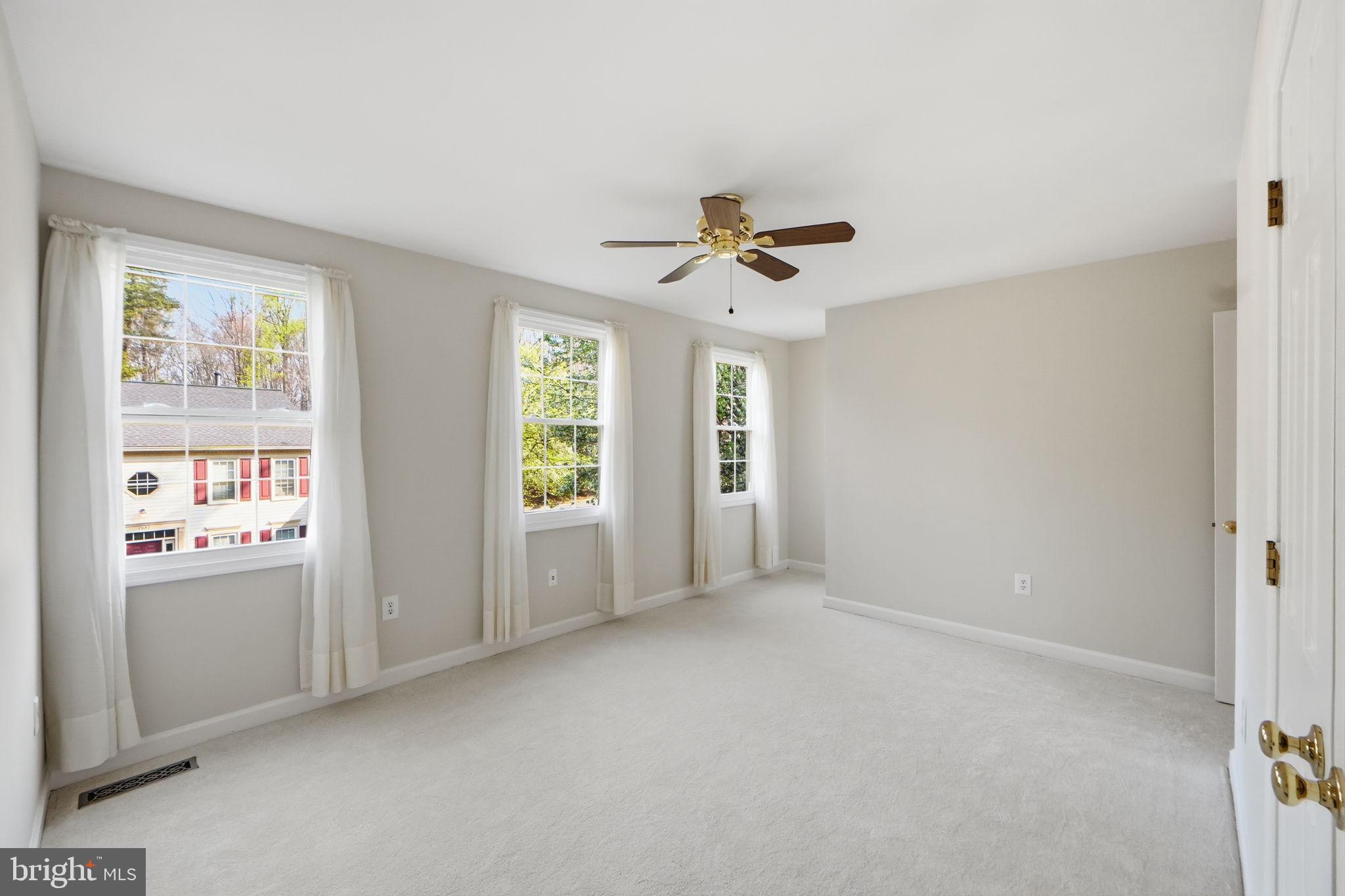 7504 Mullingar Court Springfield, VA 22153 - Photo 39 of 60 a view of an empty room with a window