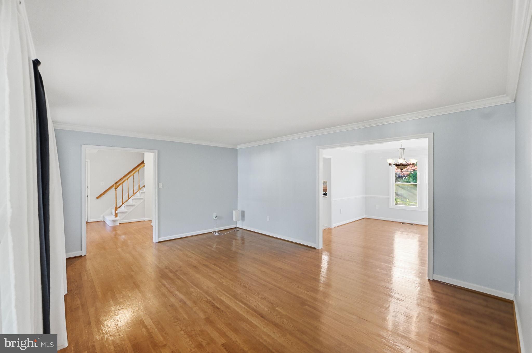 7504 Mullingar Court Springfield, VA 22153 - Photo 8 of 60 a view of empty room with wooden floor