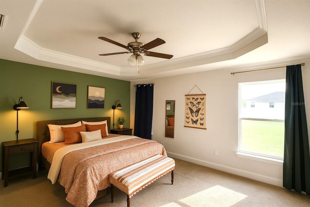 9148 Southeast 49th Avenue Road Ocala, FL 34480 - Photo 11 of 22 a bedroom with a bed and a window