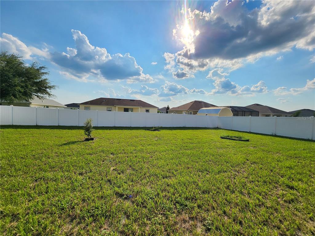 9148 Southeast 49th Avenue Road Ocala, FL 34480 - Photo 20 of 22 a view of an ocean and a yard
