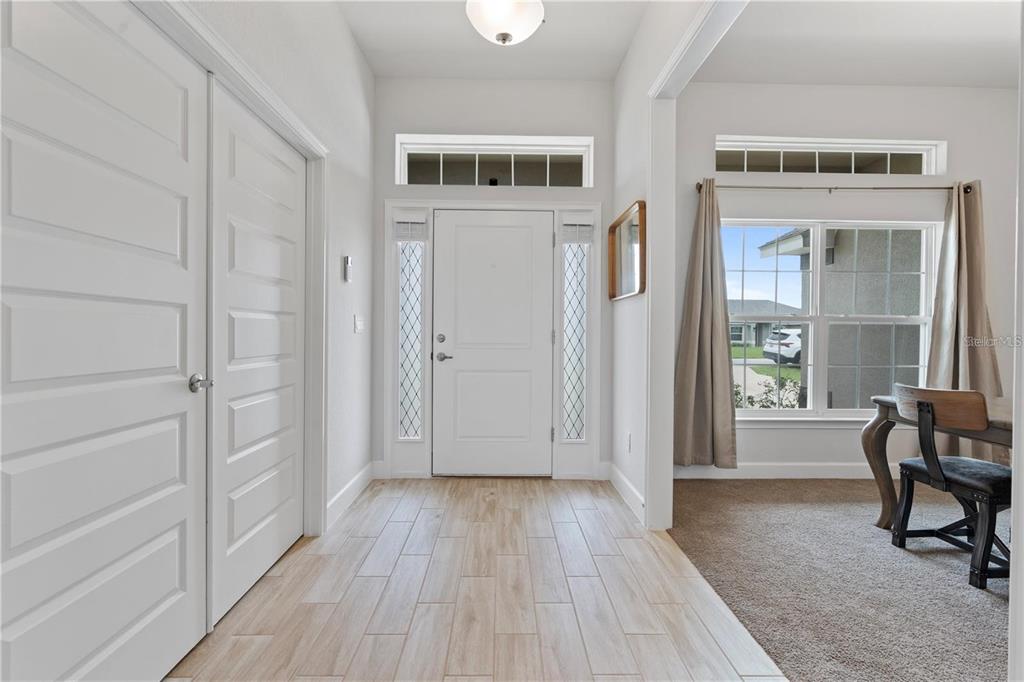 9148 Southeast 49th Avenue Road Ocala, FL 34480 - Photo 2 of 22 a view of a livingroom with furniture and windows