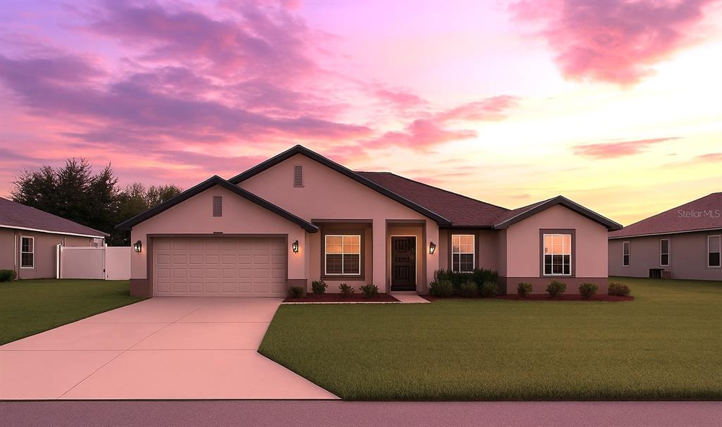 9148 Southeast 49th Avenue Road Ocala, FL 34480 - Photo 21 of 22 a front view of a house with a garden and yard