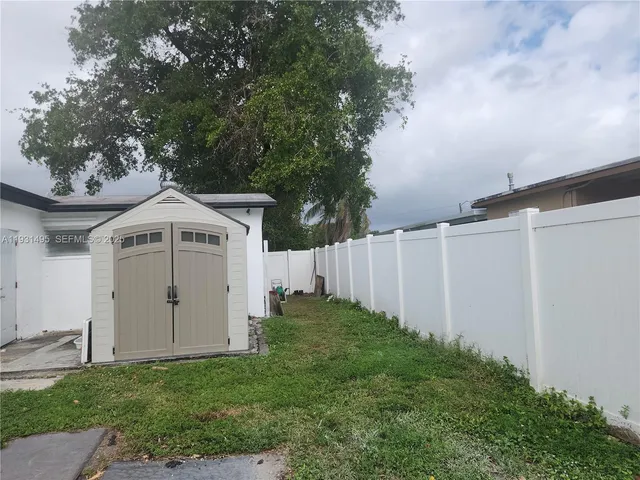 a house view with a garden space