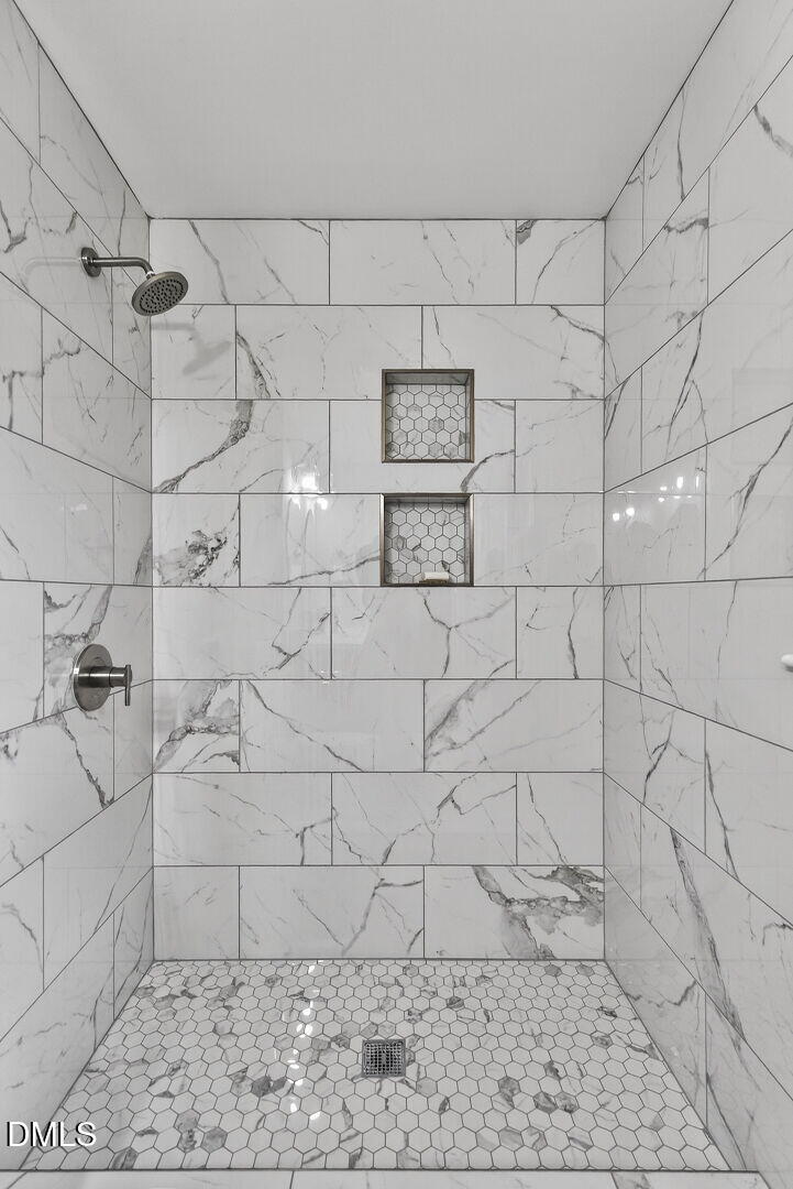 517 Cooper Road Raleigh, NC 27610 - Photo 20 of 29 BEAUTIFUL MARBLE TILE SHOWER