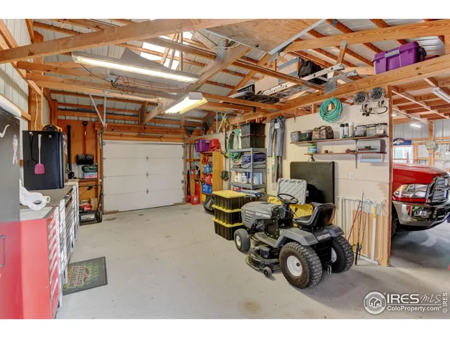 a kitchen with a refrigerator and a sink
